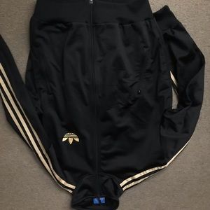Black and gold womens adidas track jacket